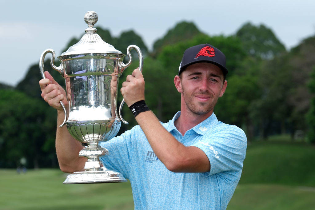 David Puig poses with the Malaysian Open trophy
